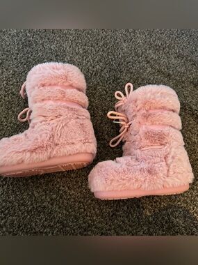 Pink fuzzy boots
